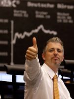 glücklich an der Börse mit dem nmh-Team